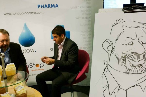 Schnellzeichner auf Messe, Karikatur auf Papier