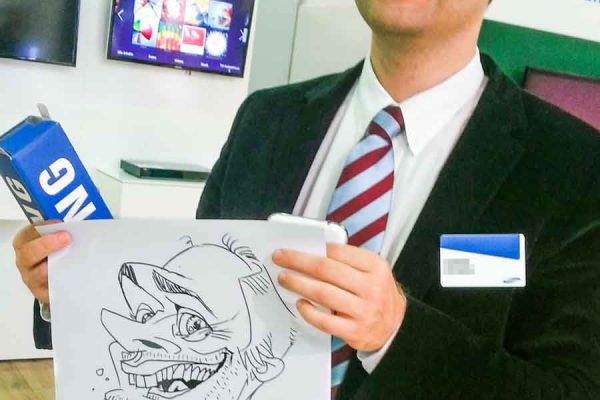 Schnellzeichner auf Messe, Karikatur Digital