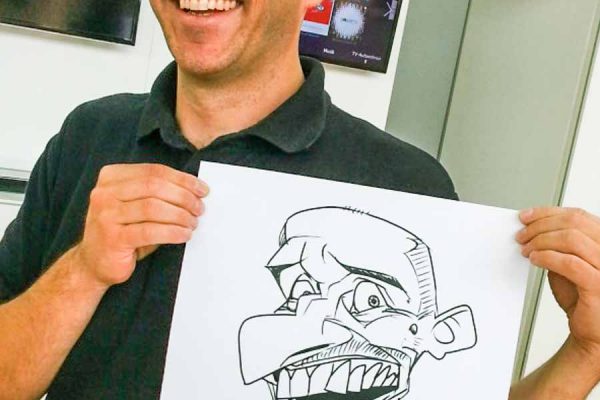 Schnellzeichner auf Messe, Karikatur Digital