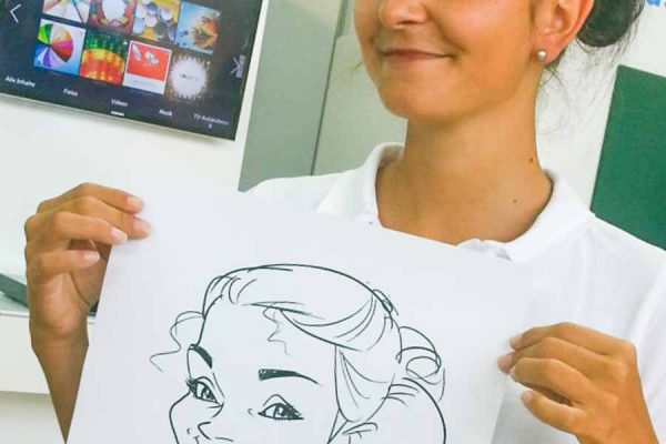 Schnellzeichner auf Messe, Karikatur Digital