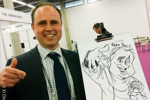 Schnellzeichner auf Messe, Karikatur auf Papier